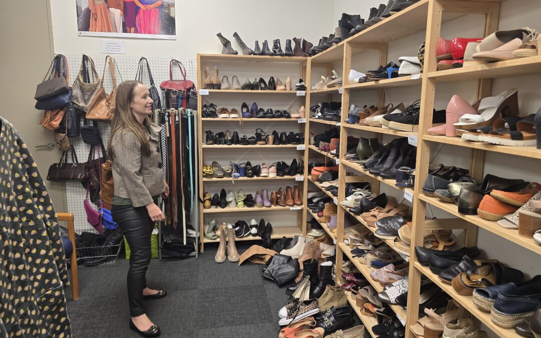 Emily Owens browses the shoe rack at the Khyber Pass Dress for Success clothing boutique