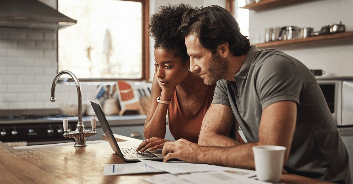 A couple reviewing Important Information